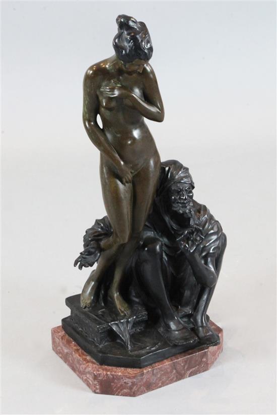 A bronze group of an Arab and slave girl, 26.5in.